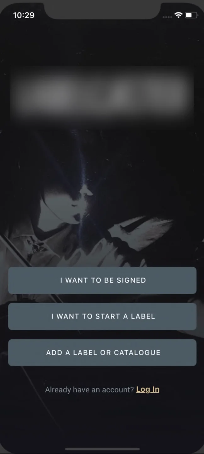 Old app welcome screen with three buttons: I want to be signed, I want to start a label, Add a label or catalogue. The logo is blurred.